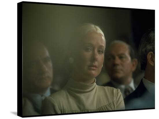 gjon-mili-maureen-dean-listening-to-husb